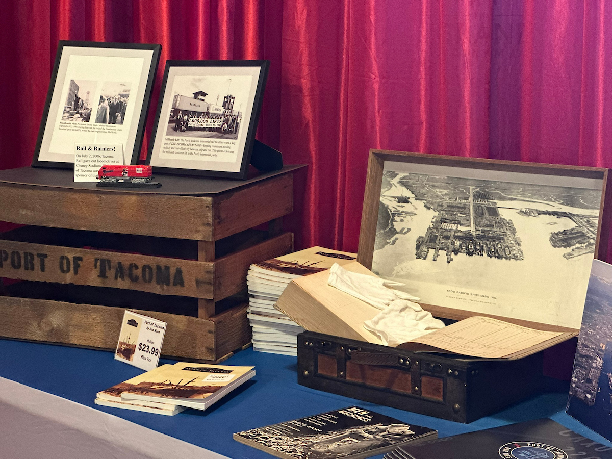 A table with vintage Port paraphernalia and marketing assets.