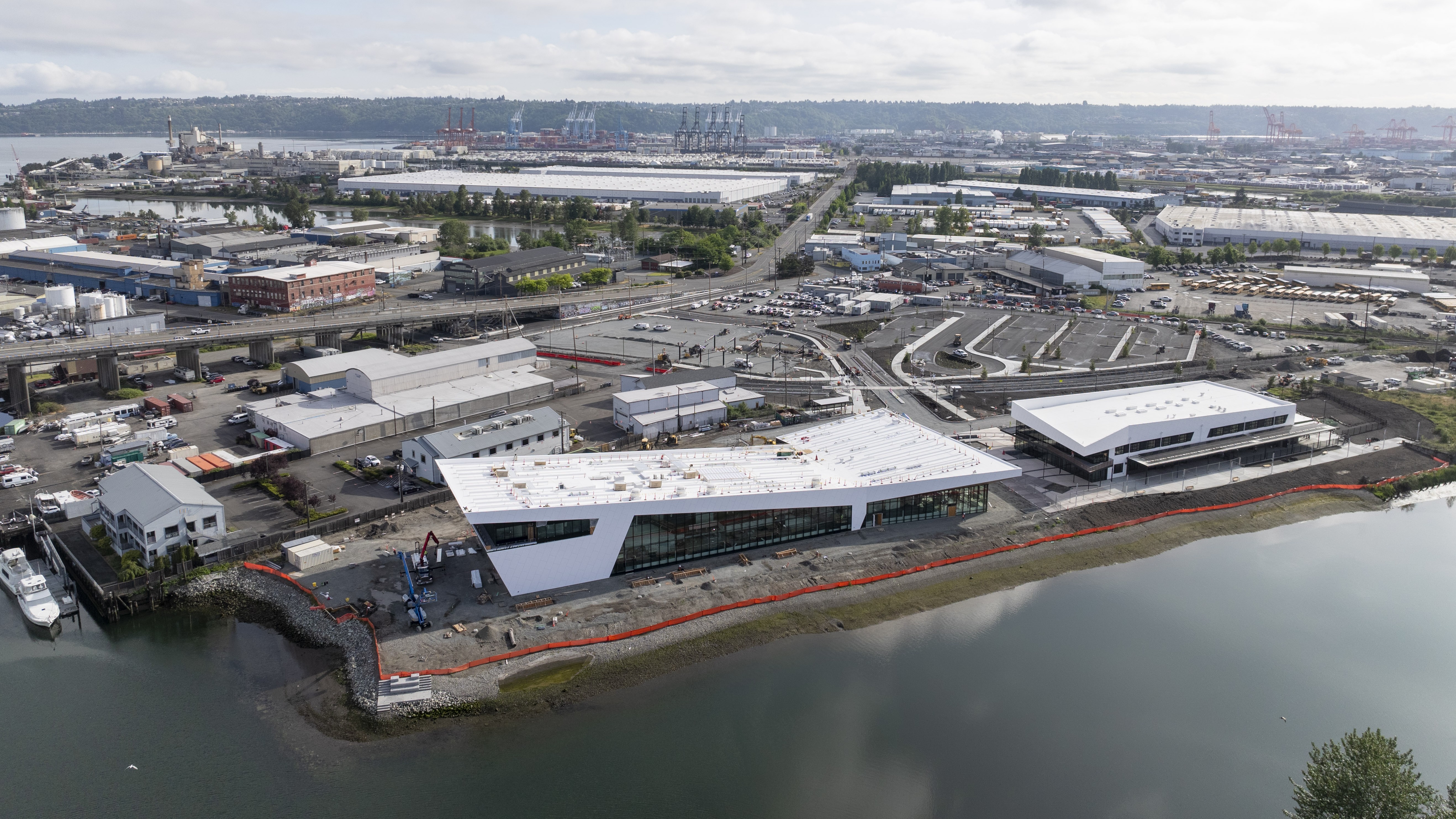 Aerial view of the Maritime Center construction site along the Foss Waterway.