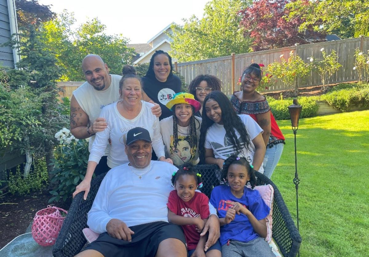 Louis Cooper Jr. surrounded by his family.