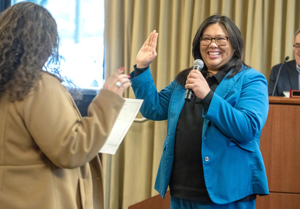 Puyallup Tribe of Indians council member Anna Bean, left, swears in Commissioner Kristin Ang to her second term on the Port of Tacoma commission.